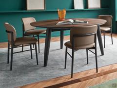 Cardinal solid wood table with round wooden top and shaped edges