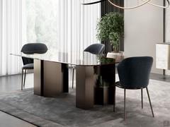 Table with built-in vases Zentrum in the fixed barrel version of 200 x 100 cm, top with beveled edge in smoked glass and bronze-painted metal base to match the frame of the chairs