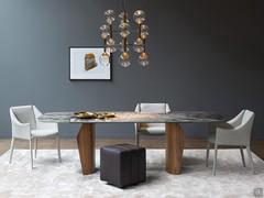 Strong scenic impact of the Flame table thanks to its textural contrast and glossy ceramic stone