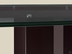 Detail of the clear smoked glass top, with clearly visible under-top flanges that give the Phantom table its distinctive industrial look