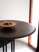 Detail of the Ø80 cm round top of the Graphic bistro table