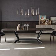 Planer is a ceramic marble dining table with elegant metal structure designed by Cattelan