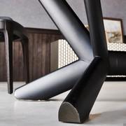 Detail of the structure of Planer table by Cattelan in graphite embossed painted metal