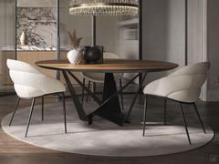 Skorpio design dining room table by Cattelan in round version with wooden top