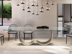 Table with designer metal Hadley base and shaped glass top available in two sizes