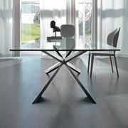 Spyder table with metal base and glass top