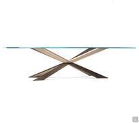 Spyder glass table up to three meters long by Cattelan