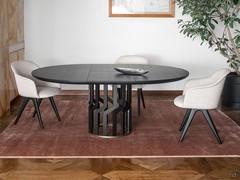 Table Intreccio made of wood that when extended becomes oval 190 x 140 cm