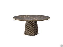 The table is also available with a round top, in the same finishes as the rectangular and shaped versions