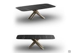 Table Ivy in the fixed version with sahara noir matte ceramic barrel top and champagne-painted metal cross-legged base