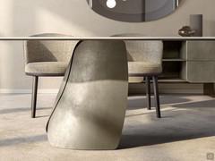 Akeyo shaped ceramic top table with base composed of two elements with a distinctive shell shape