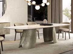 Akeyo shaped ceramic top table combined with Piper chairs with wooden legs