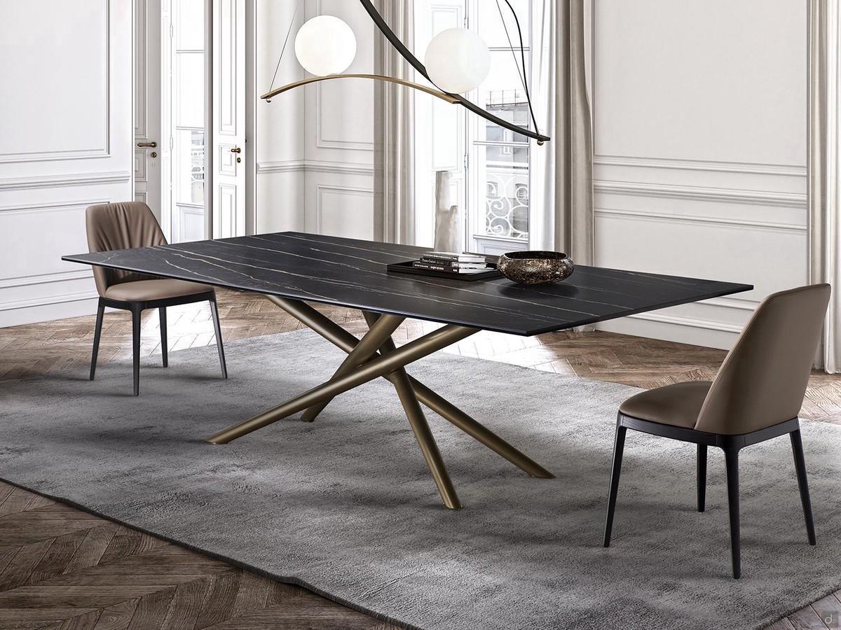 Masami dining table with crossed legs in bronze metal and top in matt Portoro ceramic 