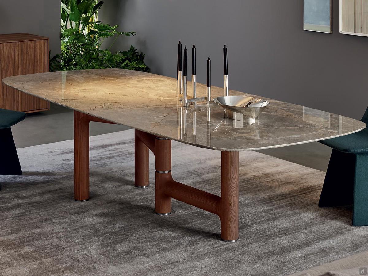 Pivot Fixed table by Bonaldo with a stone top  and asymmetrical base in walnut wood