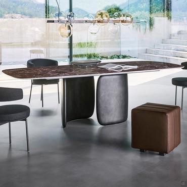 Mellow designer table with central base by Bonaldo