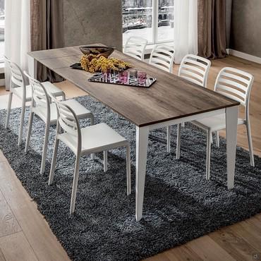 Modesty extending table with corner legs and primordial oak HPL top