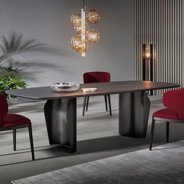 Flame table with curved metal base by Bonaldo