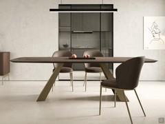 Desire table with bronze-painted metal legs and fixed 240 x 120 cm barrel-shaped top in dark brown HPL stone laminate