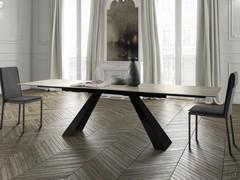 Desire table with black painted metal legs and extensible rectangular ceramic glass top