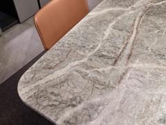 Detail of polished Fior di Pesco marble, one of the stones available for the Tenso table top