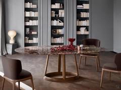 Greeny dining table in oval format with polished emperador marble top and solid wood base in American walnut