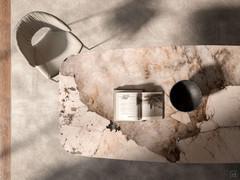 Papel table by Cattelan in the version with Keramik stone barrel top in KM14 Corcovado finish