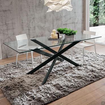 Argus glass table with crossed legs