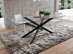 Glass table with crossed Argus legs, painted metal base and top available in various materials