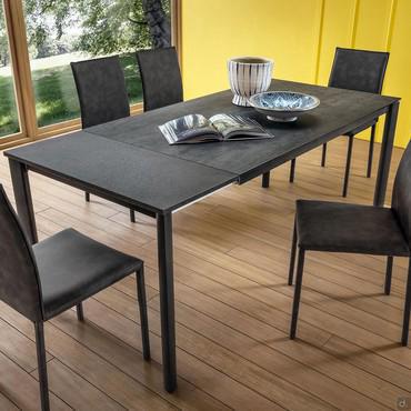 Nimbus dining table with stone laminam top