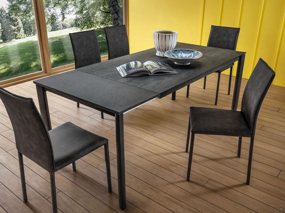 Nimbus dining table with stone laminam top