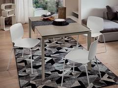 Hermione extending dining table with stone top Laminam fokos terra