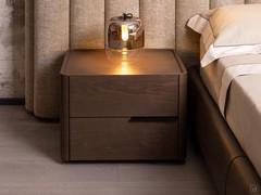 Libra bedside table with a rounded structure, paired with the Lounge bed