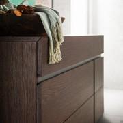 Detail of drawers with grip profile and 45° cut edge