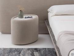 Diaspro bedside table covered in Floriante fabric with Glossy golden Calacatta top