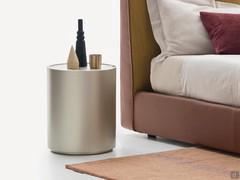 Cylindrical nightstand Weston with hinged door: single-color version in palladium micalized lacquer