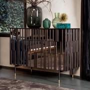 3-drawer dress Drops with coal grey lacquered metal base and brass feet 