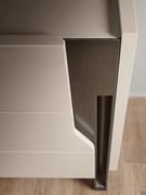 The drawer fronts form a delicate moulding on the side, thus allowing the opening