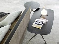 Coffee table used as a bedside table with ceramic top Indianapolis in round and rectangular versions with rotodnate shapes