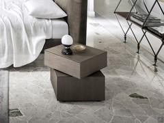 Giro nightstand with two elements combined with an upholstered bed from the San Giacomo collection