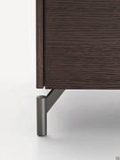 Detail of the metal foot of the bed unit Marquis, available in two colors