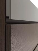 Detail of the Mason modular storage unit throat, in mocha shine painted metal or matte lacquer