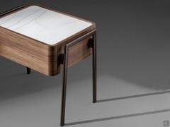 Walnut wood and painted metal meet the ceramic stone of the top, creating a precious chromatic and material effect