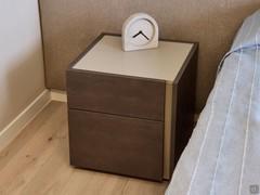 Two-drawer bedside table frame and fronts in old copper melamine with contrasting top and throat in jute melamine