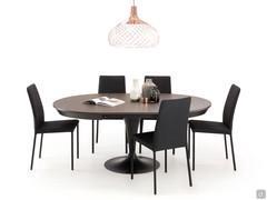 Elio extending round table that once open becomes oval to host 8 people