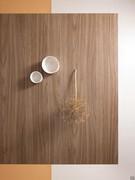 Detail of the Cleaf Natural Walnut laminate top, one of the finishes available for the Profile table