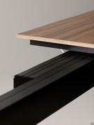 Details of the extensible runners of the Profile table, in metal to match the frame