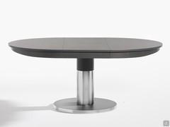 Extendable round table with central base Diva with extension mechanism hidden under the top