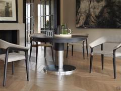 Diva oval extending table - oak extensible top with polished stainless metal or burnished brass base