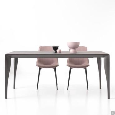 Mistral extending rectangular table with four sabre-shaped legs