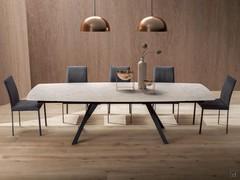 Ludwig extending dining room table with marble-effect Laminam ceramic top and double under-top side extension